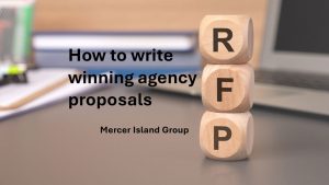 Person writing notes for an agency proposal